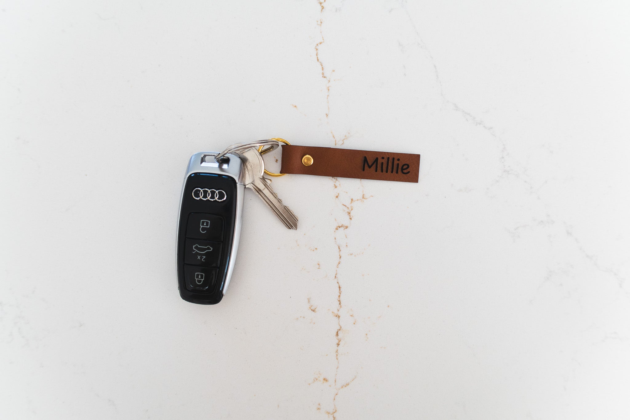 Sleutelhanger (10 st.) leder gegraveerd