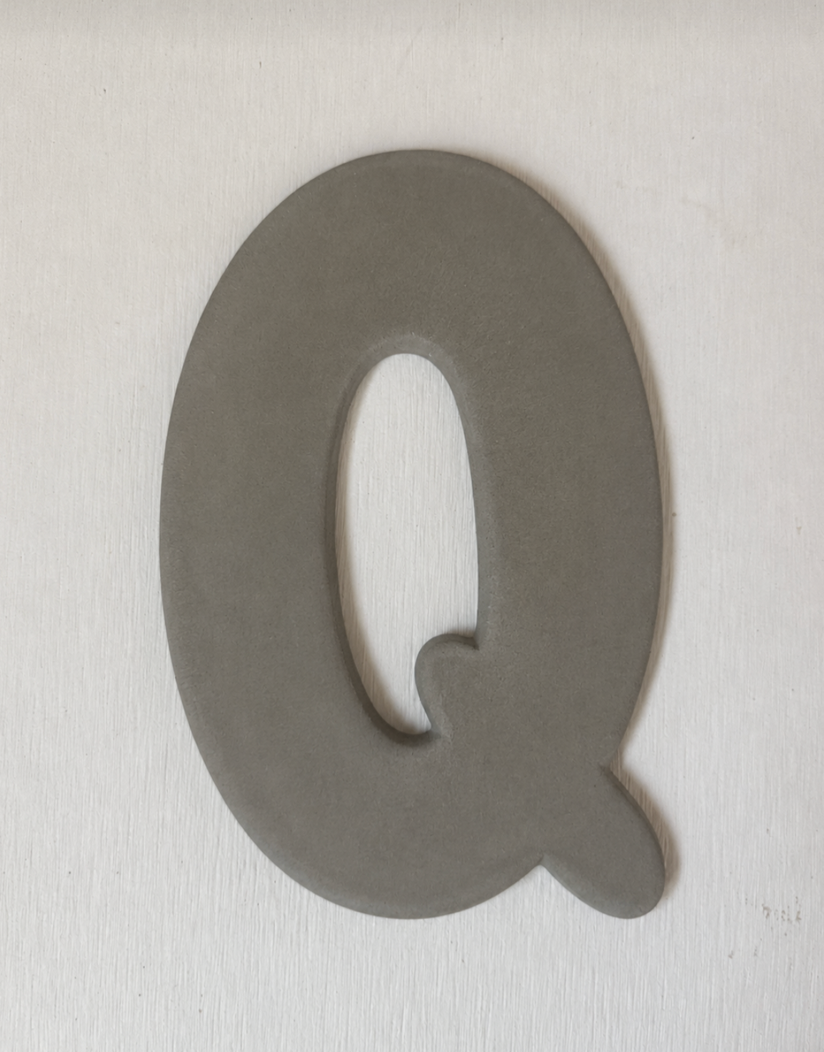 Keramische letter Q