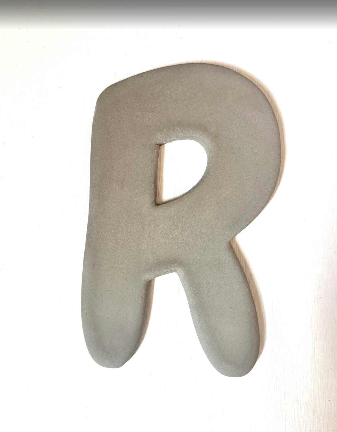 Keramische letter R