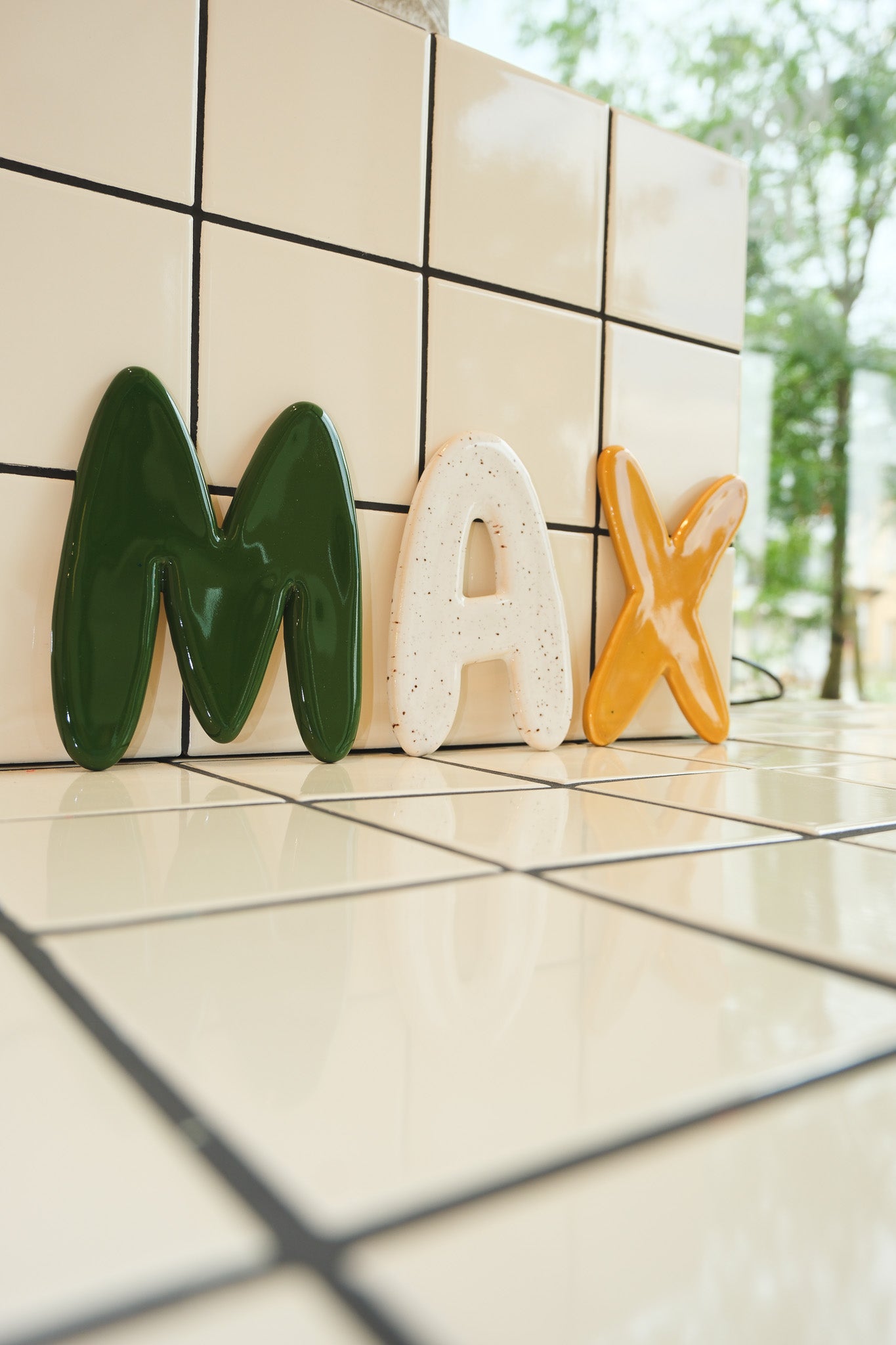 Keramische letter M