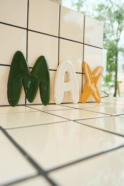 Keramische letter M