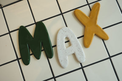 Keramische letter M