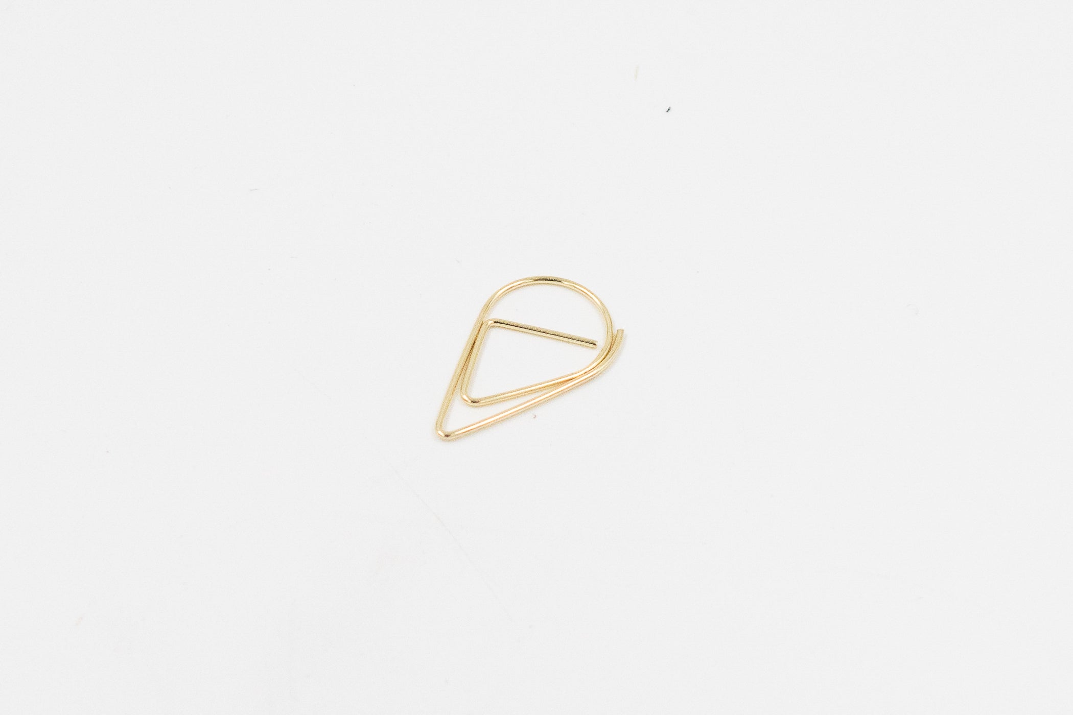 Paperclip druppel goud