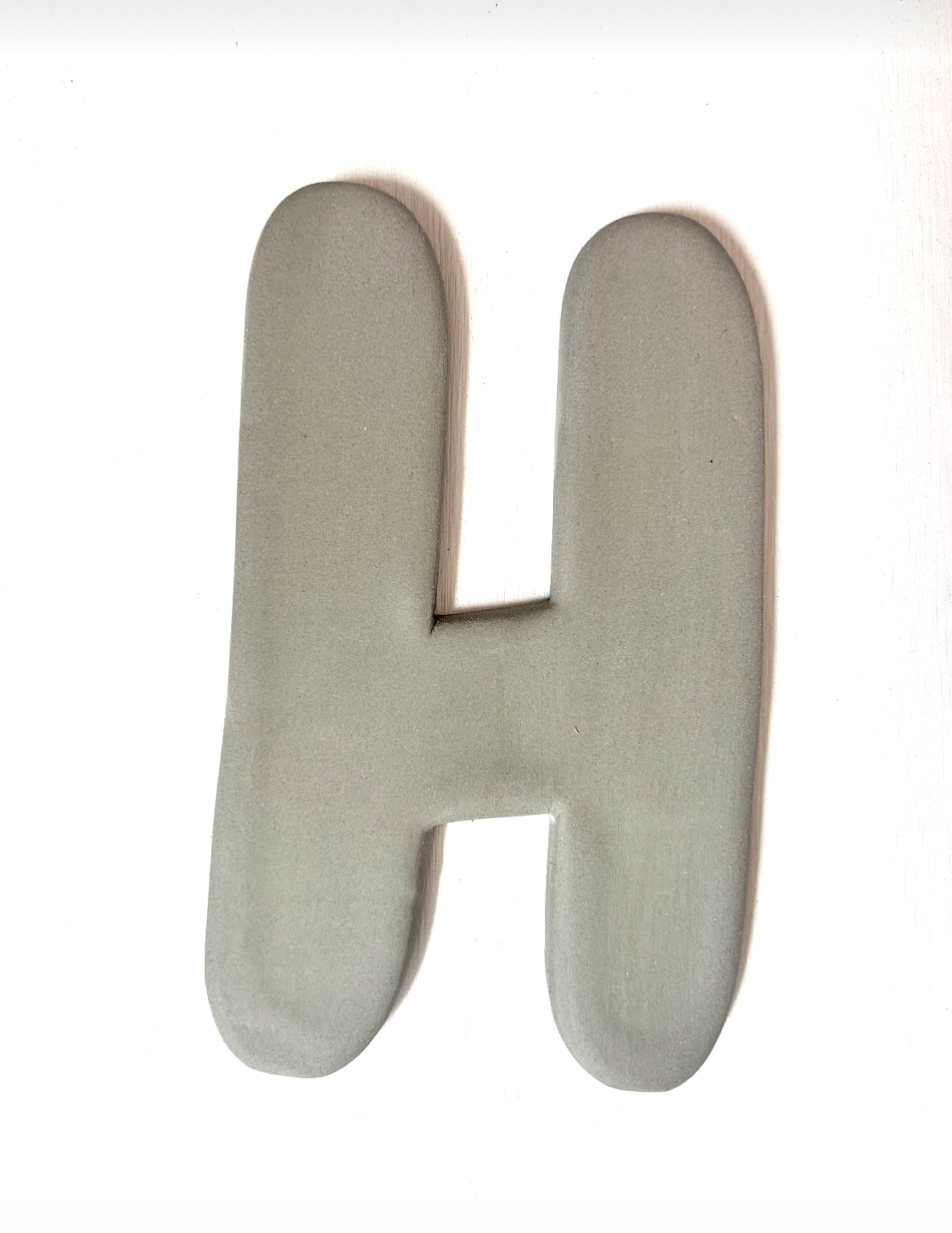 Keramische letter H