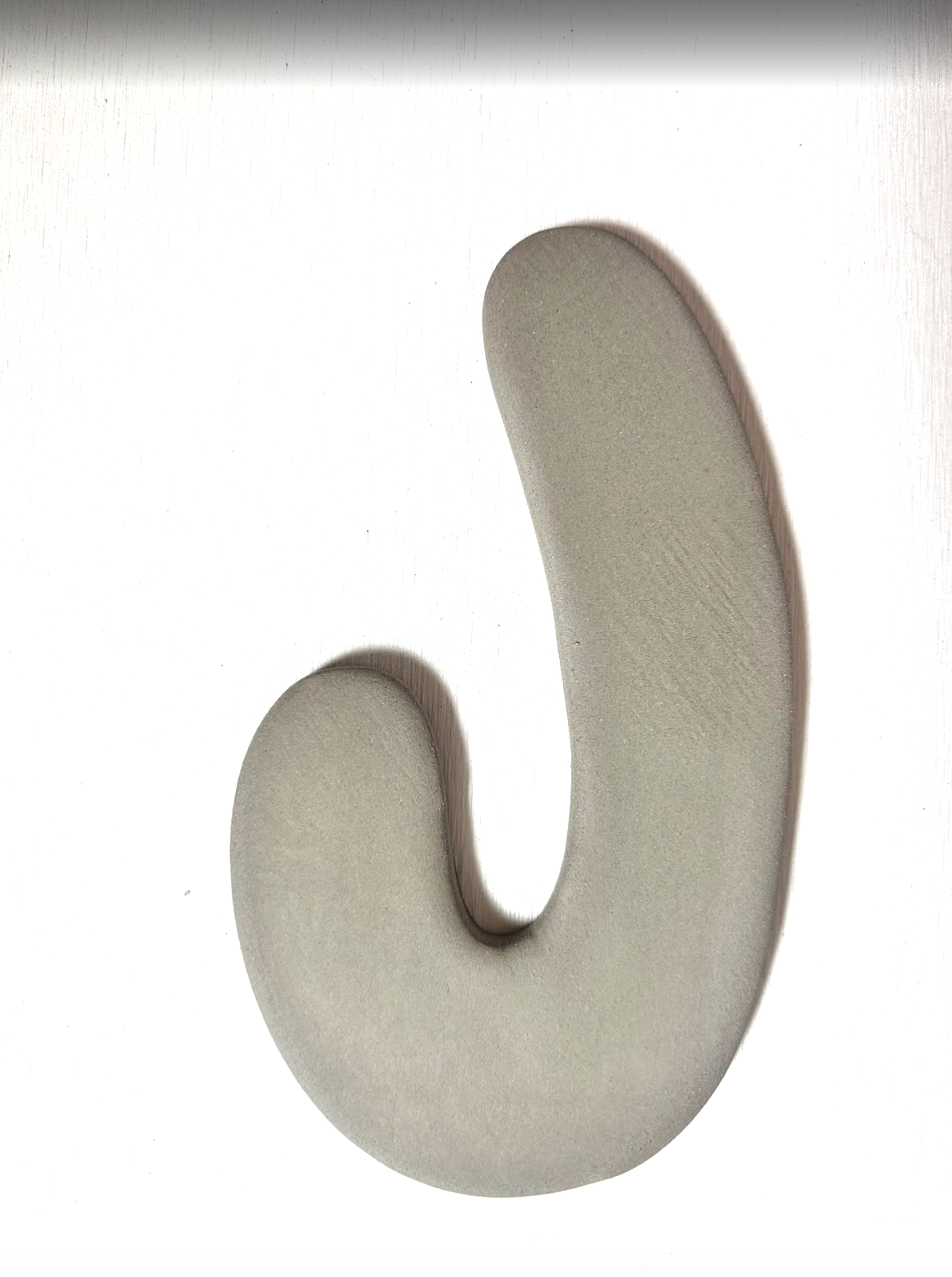 Keramische letter J